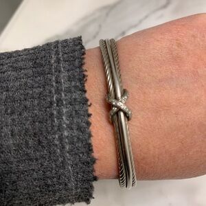 Sterling Silver cuff bracelet with Diamond X. Marked 925 and CIJ.